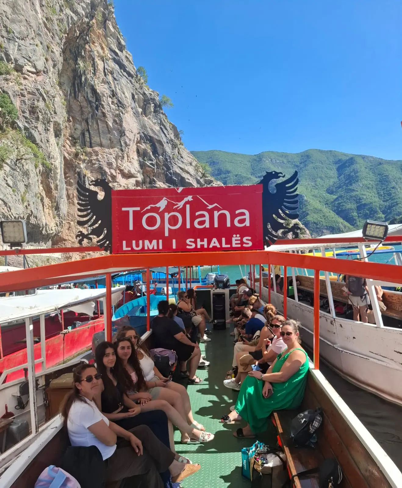 View from the boat while sailing between the mountains